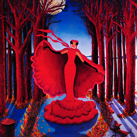 woman with red cape in night time forest
