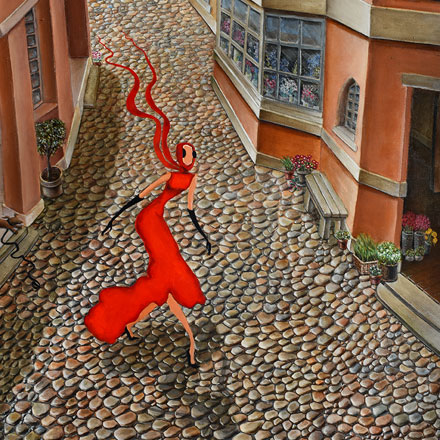woman in red dress walking down cobblestone street