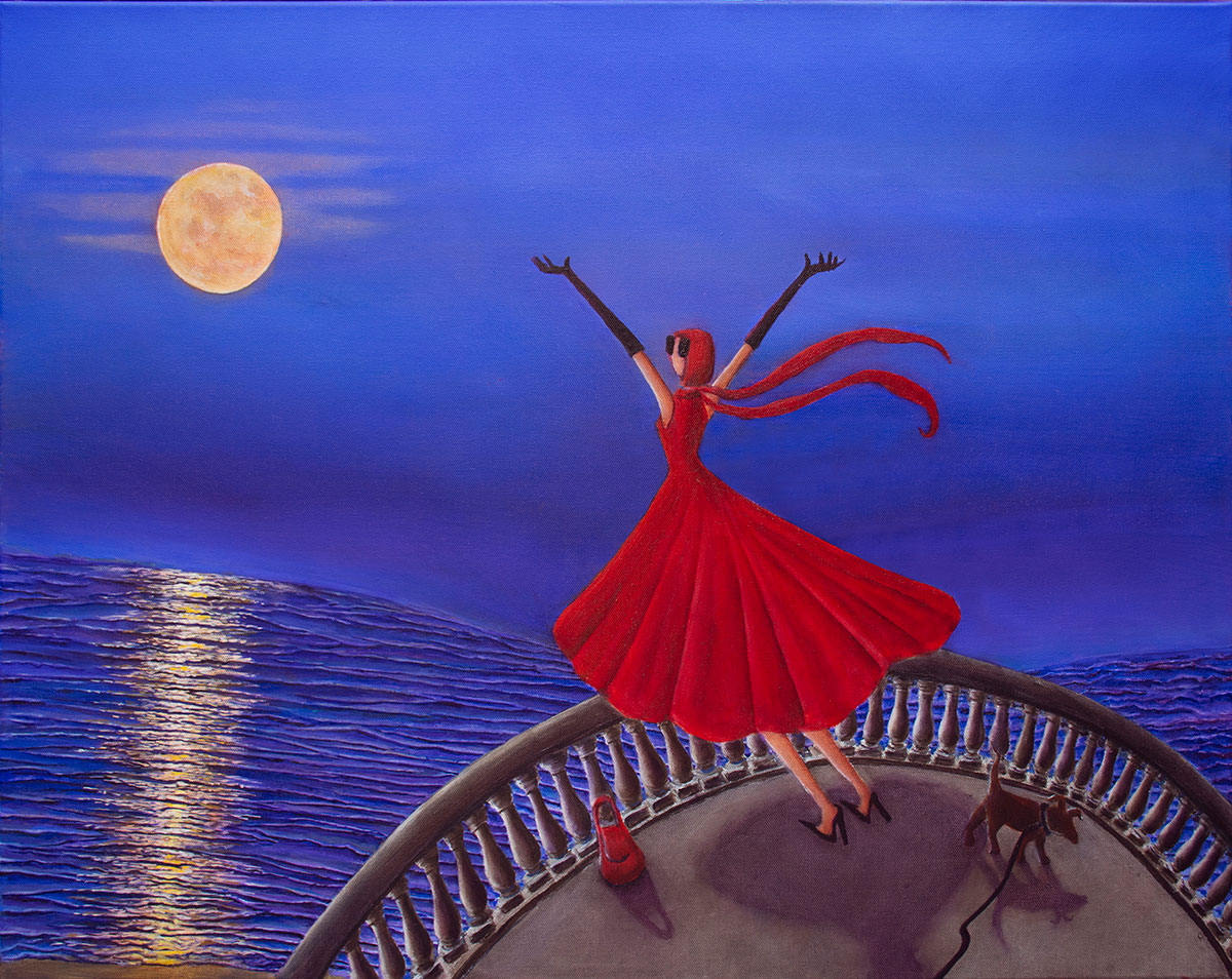 Woman in red dress looking at moon rising from the ocean